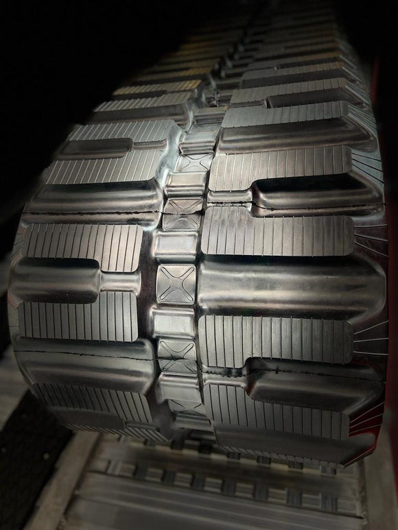 Cingoli in gomma per Bobcat 323