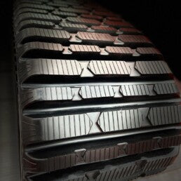 Cingoli in gomma per Bobcat 323